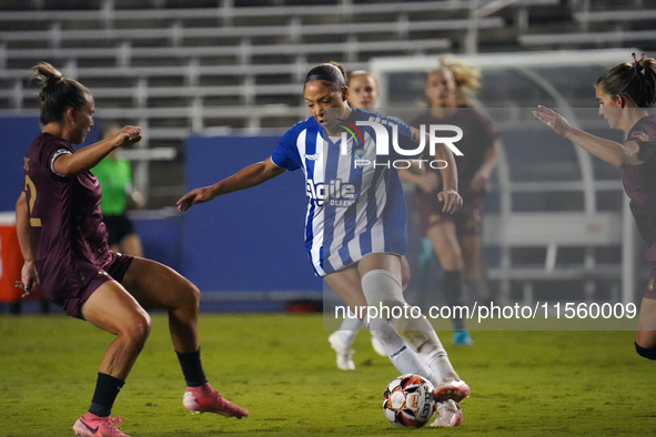 Jorian Baucom #5 drives the ball forward during the USL Super League match between Dallas Trinity FC and DC Power FC at the Cotton Bowl in D...