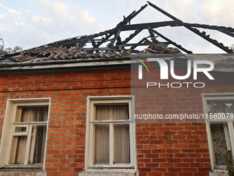 A house is damaged as a result of Russian shelling with cluster munitions in Derhachi, Kharkiv region, north-eastern Ukraine, on September 8...