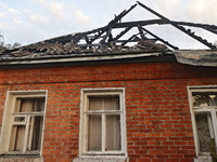 A house is damaged as a result of Russian shelling with cluster munitions in Derhachi, Kharkiv region, north-eastern Ukraine, on September 8...