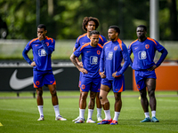 Netherlands players Ryan Gravenberch, Justin Kluivert, Joshua Zirkzee, Quinten Timber, and Brian Brobbey during the training and press confe...