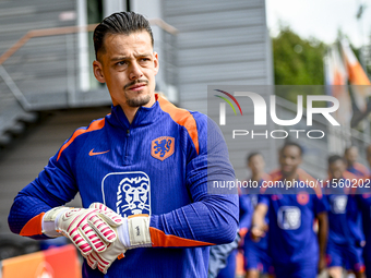 Netherlands goalkeeper Nick Olij participates in the training and press conference for the Netherlands Nations League season 2024-2025 at th...