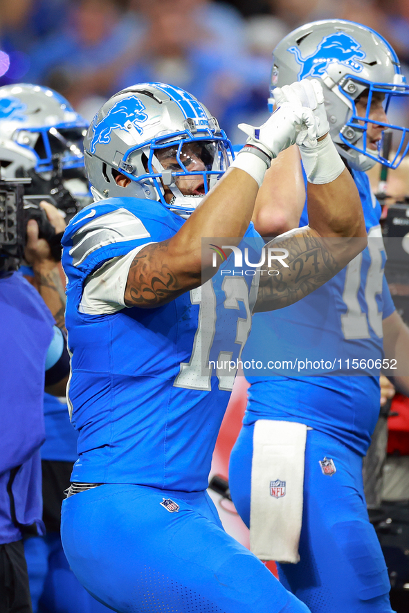 DETROIT,MICHIGAN-SEPTEMBER 8:  Running back Craig Reynolds (13) of the Detroit Lions celebrates a Lions win at the conclusion of a game betw...