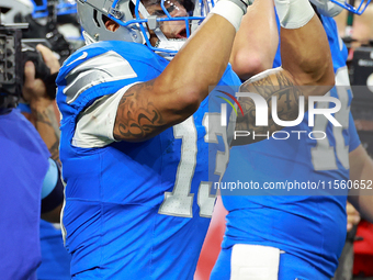 DETROIT,MICHIGAN-SEPTEMBER 8:  Running back Craig Reynolds (13) of the Detroit Lions celebrates a Lions win at the conclusion of a game betw...