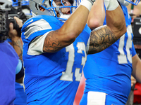 DETROIT,MICHIGAN-SEPTEMBER 8:  Running back Craig Reynolds (13) of the Detroit Lions celebrates a Lions win at the conclusion of a game betw...