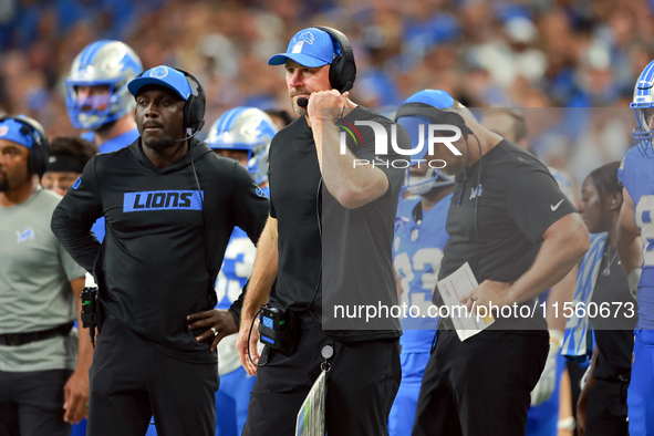 DETROIT,MICHIGAN-SEPTEMBER 8: Detroit Lions head coach Dan Campbell looks on from the sidelines during a game between the Detroit Lions and...