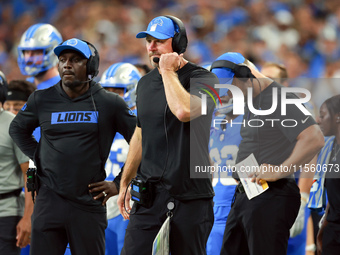 DETROIT,MICHIGAN-SEPTEMBER 8: Detroit Lions head coach Dan Campbell looks on from the sidelines during a game between the Detroit Lions and...