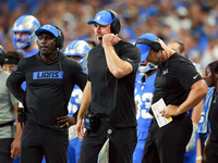 DETROIT,MICHIGAN-SEPTEMBER 8: Detroit Lions head coach Dan Campbell looks on from the sidelines during a game between the Detroit Lions and...