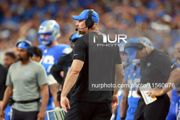 DETROIT,MICHIGAN-SEPTEMBER 8: Detroit Lions head coach Dan Campbell looks on from the sidelines during a game between the Detroit Lions and...