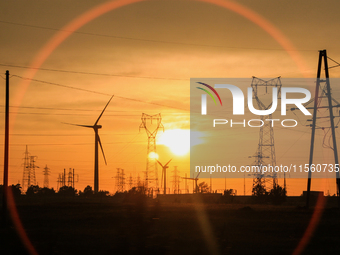 Wind power generation facilities on Zhangbei Bashang Grassland in Zhangjiakou, China, on June 28, 2013. (