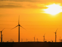 Wind power generation facilities on Zhangbei Bashang Grassland in Zhangjiakou, China, on June 28, 2013. (