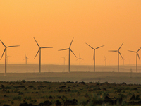 Wind power generation facilities on Zhangbei Bashang Grassland in Zhangjiakou, China, on June 28, 2013. (