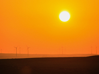 Wind power generation facilities on Zhangbei Bashang Grassland in Zhangjiakou, China, on June 28, 2013. (