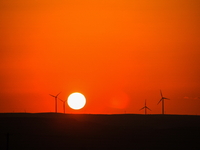 Wind power generation facilities on Zhangbei Bashang Grassland in Zhangjiakou, China, on June 28, 2013. (