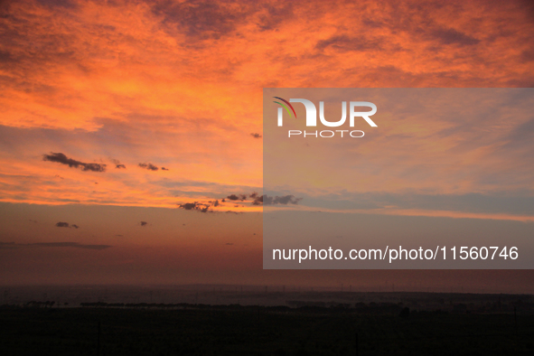 Wind power generation facilities on Zhangbei Bashang Grassland in Zhangjiakou, China, on June 28, 2013. 