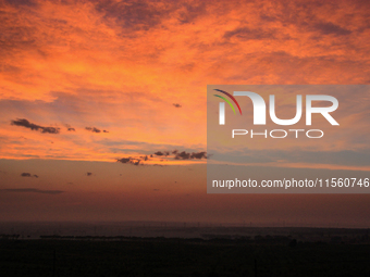 Wind power generation facilities on Zhangbei Bashang Grassland in Zhangjiakou, China, on June 28, 2013. (