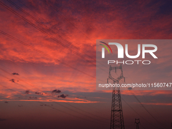 Wind power generation facilities on Zhangbei Bashang Grassland in Zhangjiakou, China, on June 28, 2013. (