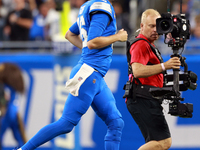 DETROIT,MICHIGAN-SEPTEMBER 8:  Quarterback Jared Goff (16) of the Detroit Lions runs off the field after winning the coin toss during overti...