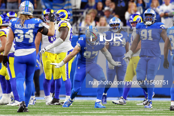 DETROIT,MICHIGAN-SEPTEMBER 8:  Defensive end Aidan Hutchinson (97) of the Detroit Lions celebrates a play during a game between the Detroit...