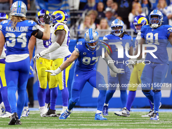 DETROIT,MICHIGAN-SEPTEMBER 8:  Defensive end Aidan Hutchinson (97) of the Detroit Lions celebrates a play during a game between the Detroit...