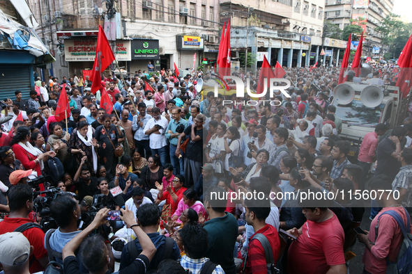 Activists Left Supporters shout slogans during a protest rally towards Lalbazar, the official Kolkata Police headquarters of West Bengal sta...