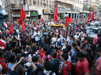 Activists Left Supporters shout slogans during a protest rally towards Lalbazar, the official Kolkata Police headquarters of West Bengal sta...