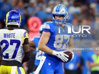 DETROIT,MICHIGAN-SEPTEMBER 8:  Tight end Sam LaPorta (87) of the Detroit Lions holds the ball after a play during a game between the Detroit...