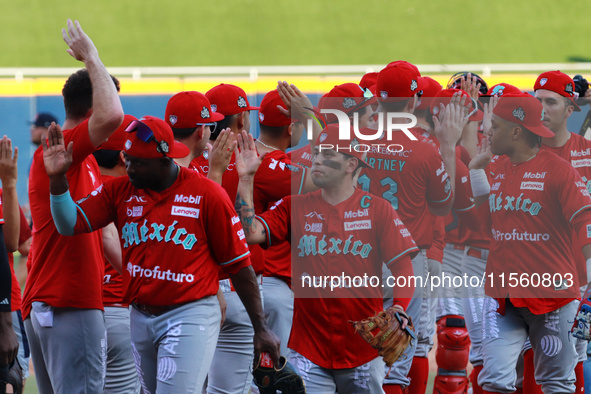 A Diablos Rojos teammate celebrates the victory after the resumption of the 2024 King Series match 3 against Sultanes de Monterrey of the Me...