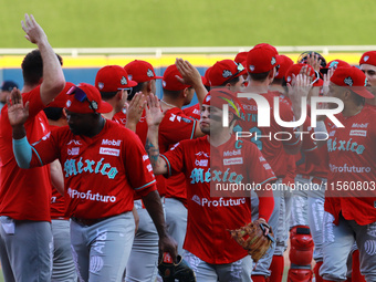 A Diablos Rojos teammate celebrates the victory after the resumption of the 2024 King Series match 3 against Sultanes de Monterrey of the Me...