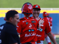 Tomohiro Anraku #20 of Diablos Rojos celebrates during the resumption of the 2024 King Series match 3 against Sultanes de Monterrey of the M...