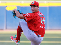 Tomohiro Anraku #20 of Diablos Rojos pitches the ball during the Resumption of the 2024 King Series match 3 against Sultanes de Monterrey of...