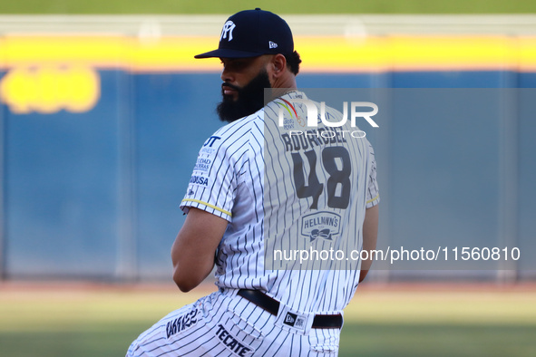 Richard Rodriguez #48 of Sultanes de Monterrey pitches the ball during the Resumption of the 2024 King Series match 3 against Diablos Rojos...