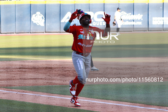 Jose Pirela #67 of Diablos Rojos celebrates after hitting a home run during the Resumption of the 2024 King Series match 3 against Sultanes...