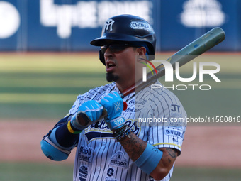 Ramiro Pena #19 of Sultanes de Monterrey bats during the resumption of the 2024 King Series match 3 against Diablos Rojos of the Mexican Bas...