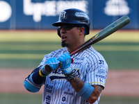 Ramiro Pena #19 of Sultanes de Monterrey bats during the resumption of the 2024 King Series match 3 against Diablos Rojos of the Mexican Bas...