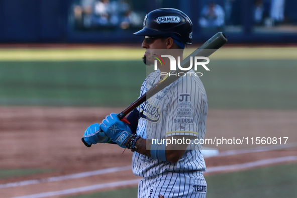 Ramiro Pena #19 of Sultanes de Monterrey bats during the resumption of the 2024 King Series match 3 against Diablos Rojos of the Mexican Bas...