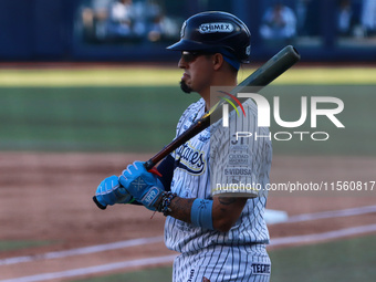 Ramiro Pena #19 of Sultanes de Monterrey bats during the resumption of the 2024 King Series match 3 against Diablos Rojos of the Mexican Bas...