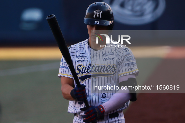 Jose Gonzalez #33 of Sultanes de Monterrey bats during the resumption of the 2024 King Series match 3 against Diablos Rojos of the Mexican B...