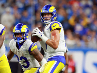 DETROIT,MICHIGAN-SEPTEMBER 8:  Quarterback Matthew Stafford (9) of the Los Angeles Rams looks to pass the ball during a game between the Det...