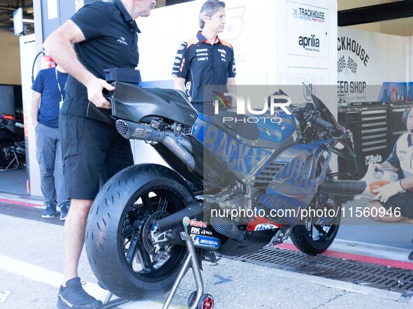 Motorcycle trails Aprilia during the MotoGP test at Misano World Circuit Marco Simoncelli in Misano Adriatico, Italy, on September 9, 2024. 