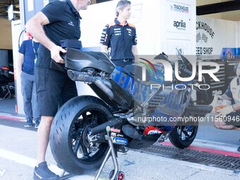 Motorcycle trails Aprilia during the MotoGP test at Misano World Circuit Marco Simoncelli in Misano Adriatico, Italy, on September 9, 2024....