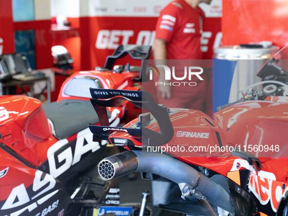 A motorcycle trails GasGas during the MotoGP test at Misano World Circuit Marco Simoncelli in Misano Adriatico, Italy, on September 9, 2024....