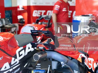 A motorcycle trails GasGas during the MotoGP test at Misano World Circuit Marco Simoncelli in Misano Adriatico, Italy, on September 9, 2024....