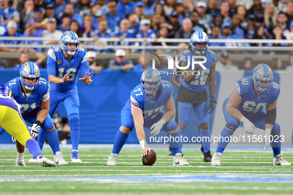 DETROIT,MICHIGAN-SEPTEMBER 8:  Quarterback Jared Goff (16) of the Detroit Lions prepares to receive the snap from center Frank Ragnow (77) o...