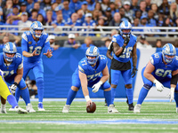 DETROIT,MICHIGAN-SEPTEMBER 8:  Quarterback Jared Goff (16) of the Detroit Lions prepares to receive the snap from center Frank Ragnow (77) o...