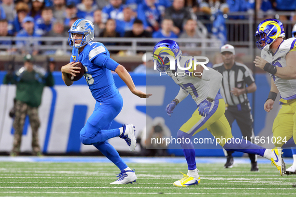 DETROIT,MICHIGAN-SEPTEMBER 8:  Quarterback Jared Goff (16) of the Detroit Lions runs the ball pursued by safety Quentin Lake (37) of the Los...