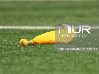 DETROIT,MICHIGAN-SEPTEMBER 8:  A flag is thrown on the field during a game between the Detroit Lions and the Los Angeles Rams in Detroit, Mi...