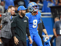 DETROIT,MICHIGAN-SEPTEMBER 8:  Wide receiver Jameson Williams (9) of the Detroit Lions walks off the field after being checked for injury du...