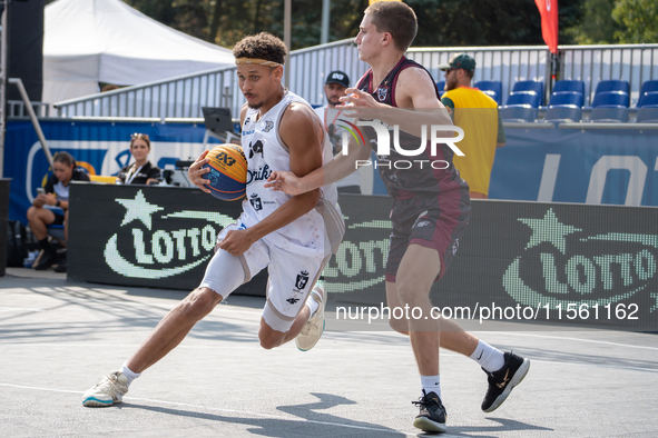 Filip Munyama and Mateusz Bryla participate in the LOTTO 3x3 League basketball game in Sosnowiec, Poland, on September 8, 2024. The Lotto 3x...