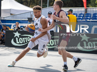 Filip Munyama and Mateusz Bryla participate in the LOTTO 3x3 League basketball game in Sosnowiec, Poland, on September 8, 2024. The Lotto 3x...