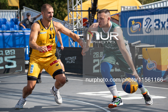 Mateusz Nitsche and Hubert Stepien participate in the LOTTO 3x3 League basketball game in Sosnowiec, Poland, on September 8, 2024. The Lotto...